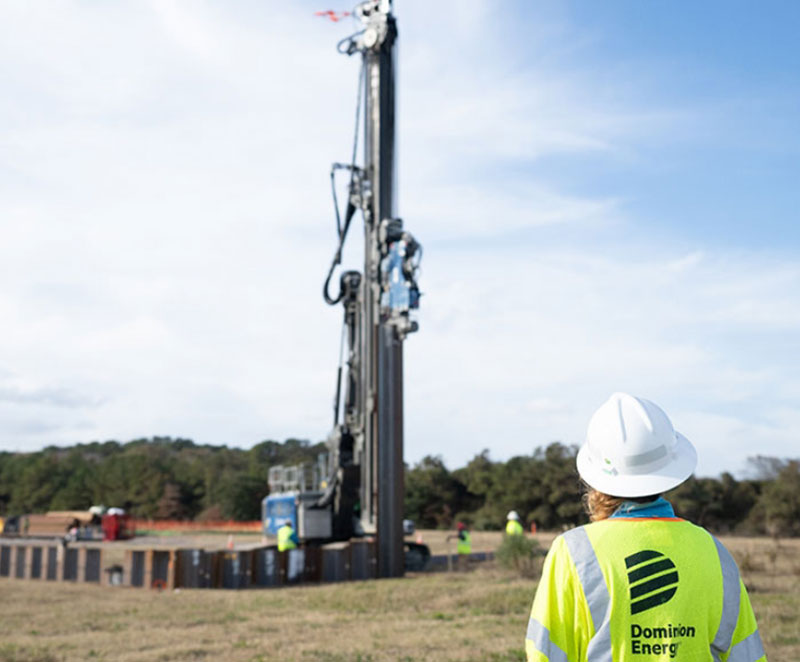 Dominion employee looking at construction