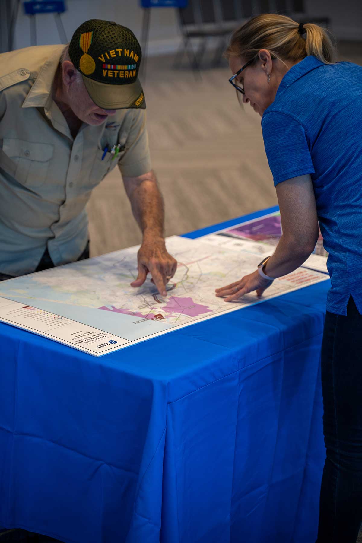 Community member reviewing map of windmills